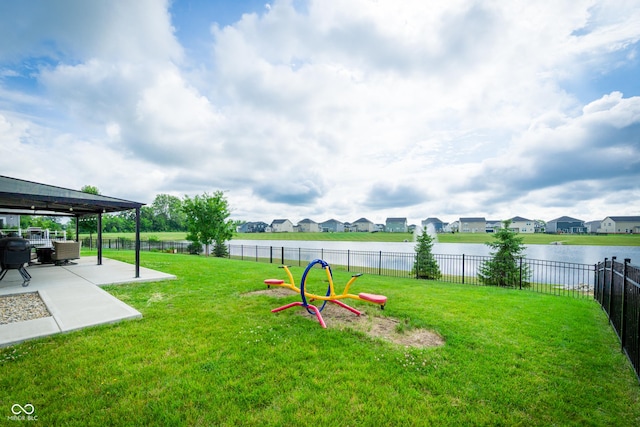 7147 Prelude Rd, Brownsburg, IN 46112 - view of yard featuring a patio, a residential view, and a water view