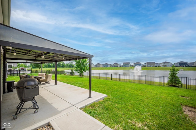 7147 Prelude Rd, Brownsburg, IN 46112 - fenced backyard with a patio, a water view, and a residential view