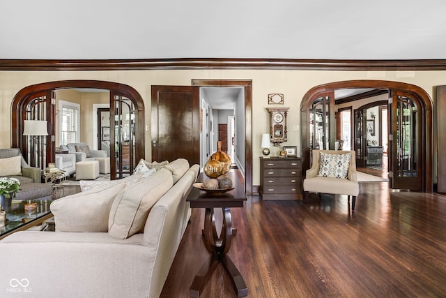 4455 Broadway St, Indianapolis, IN 46205 - living room featuring arched walkways, wood finished floors, and ornamental molding