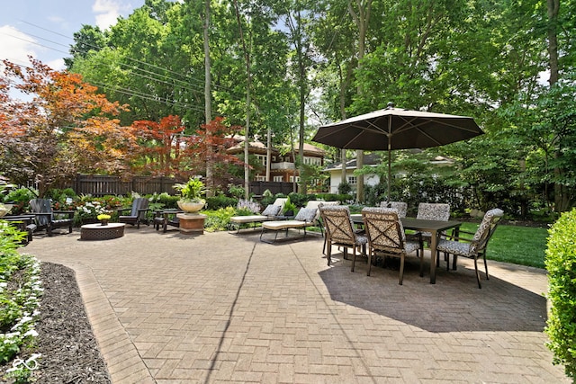 4455 Broadway St, Indianapolis, IN 46205 - view of patio featuring outdoor dining space and an outdoor fire pit
