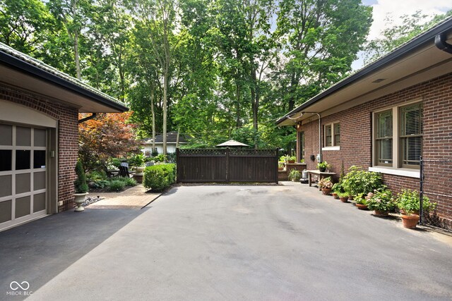 4455 Broadway St, Indianapolis, IN 46205 - view of patio / terrace with view of wooded area
