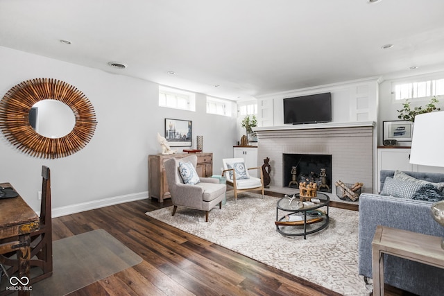 4455 Broadway St, Indianapolis, IN 46205 - living room featuring wood finished floors, healthy amount of natural light, a fireplace, and recessed lighting