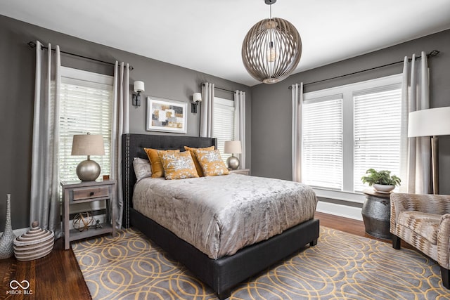 4455 Broadway St, Indianapolis, IN 46205 - bedroom with dark wood-style floors and multiple windows