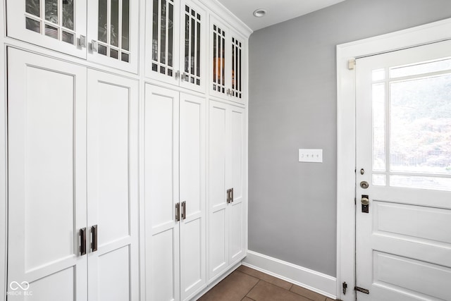 4455 Broadway St, Indianapolis, IN 46205 - doorway with plenty of natural light and dark tile patterned floors