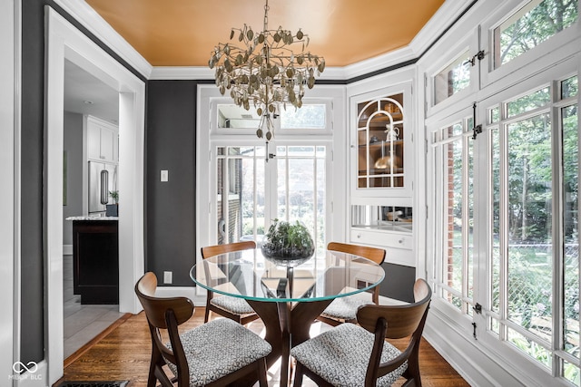 4455 Broadway St, Indianapolis, IN 46205 - sunroom / solarium with french doors, healthy amount of natural light, and a chandelier