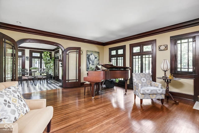 4455 Broadway St, Indianapolis, IN 46205 - living area with crown molding, healthy amount of natural light, wood finished floors, and french doors