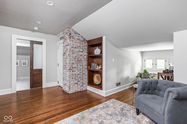 4455 Broadway St, Indianapolis, IN 46205 - living room featuring wood finished floors and vaulted ceiling