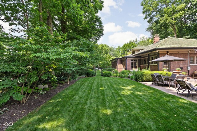 4455 Broadway St, Indianapolis, IN 46205 - view of yard featuring a patio area