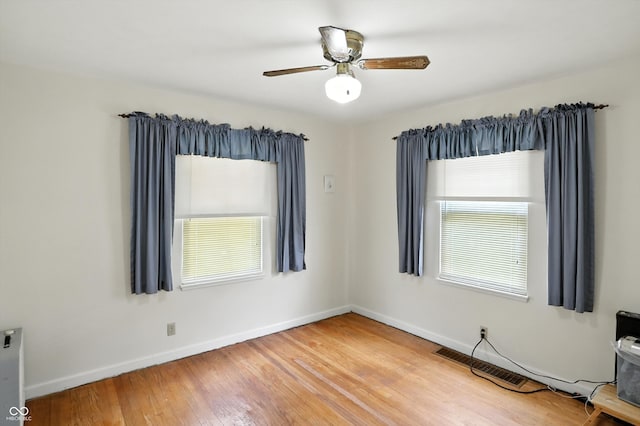 95 S 11th Ave, Beech Grove, IN 46107 - spare room with wood finished floors and a ceiling fan