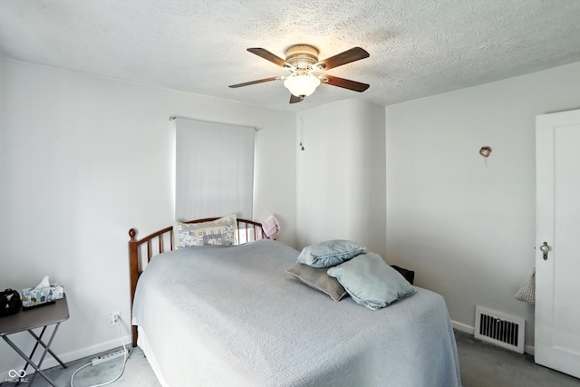 95 S 11th Ave, Beech Grove, IN 46107 - bedroom featuring a ceiling fan, carpet floors, and a textured ceiling