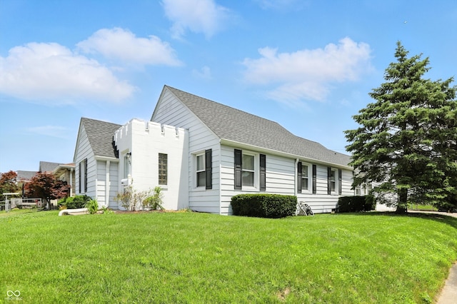 95 S 11th Ave, Beech Grove, IN 46107 - view of side of property with roof with shingles and a lawn