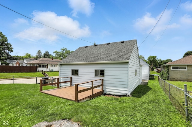 95 S 11th Ave, Beech Grove, IN 46107 - back of property with roof with shingles, a deck, and a fenced backyard