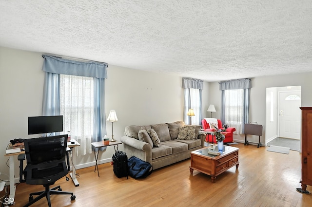 95 S 11th Ave, Beech Grove, IN 46107 - living room with a textured ceiling, wood finished floors, and a desk