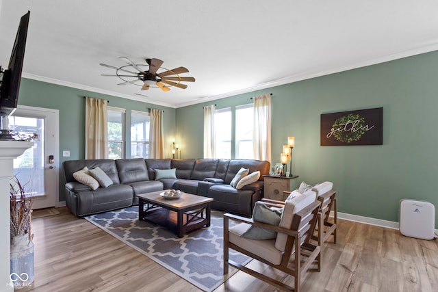 19959 Cowie Ln, Westfield, IN 46074 - living area featuring wood finished floors, crown molding, and ceiling fan