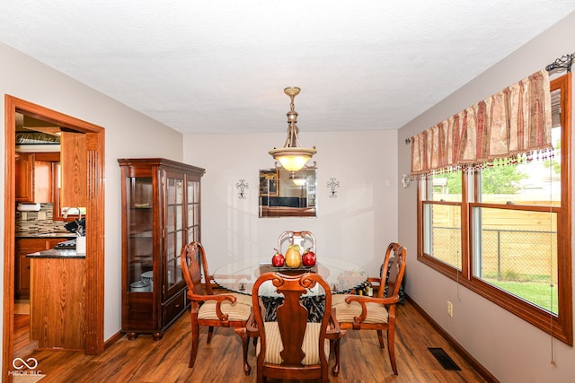 662 Leah Way, Greenwood, IN 46142 - dining room with wood finished floors and a textured ceiling