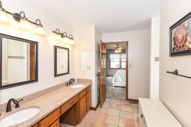 662 Leah Way, Greenwood, IN 46142 - full bath with double vanity, ensuite bath, and ceiling fan