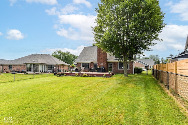 662 Leah Way, Greenwood, IN 46142 - rear view of property featuring brick siding and a fenced backyard