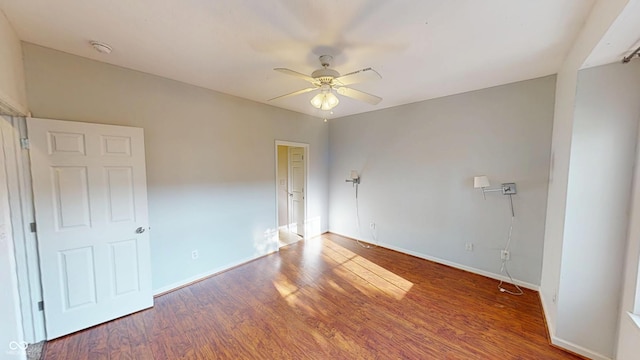 2259 Colfax Ln Unit 2259, Indianapolis, IN 46260 - unfurnished bedroom featuring wood finished floors and a ceiling fan