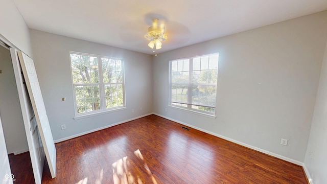 2259 Colfax Ln Unit 2259, Indianapolis, IN 46260 - unfurnished bedroom featuring wood finished floors, ceiling fan, and a closet