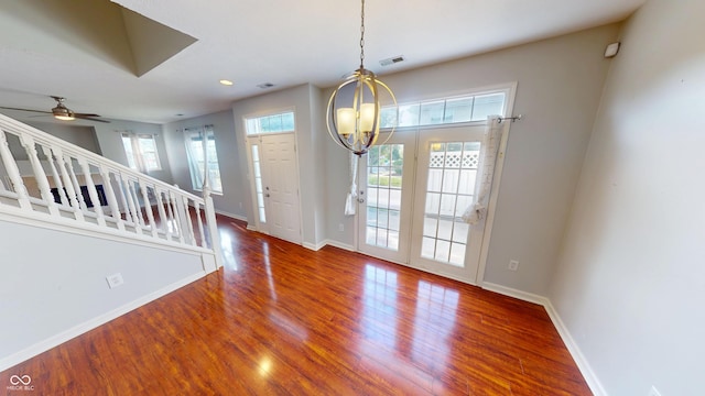 2259 Colfax Ln Unit 2259, Indianapolis, IN 46260 - entrance foyer featuring wood finished floors, stairway, ceiling fan, and recessed lighting