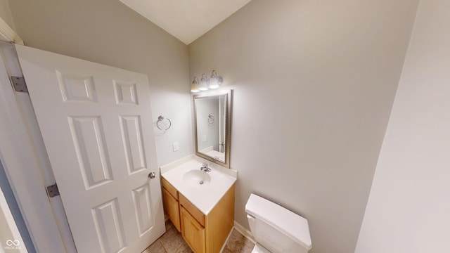 2259 Colfax Ln Unit 2259, Indianapolis, IN 46260 - bathroom featuring vanity and lofted ceiling