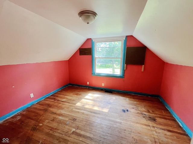 1601 E 44th St, Indianapolis, IN 46205 - bonus room featuring hardwood / wood-style flooring and lofted ceiling