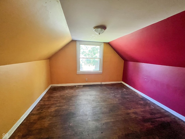 1601 E 44th St, Indianapolis, IN 46205 - additional living space with vaulted ceiling and wood finished floors