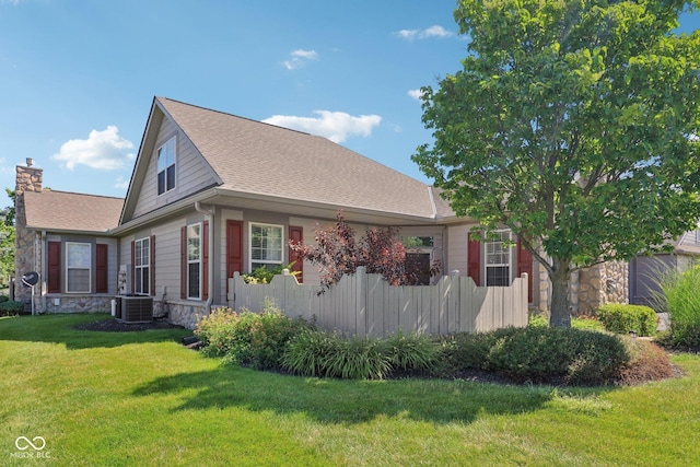 16636 Brownstone Ct, Westfield, IN 46074 - view of home's exterior featuring stone siding, a yard, a chimney, and roof with shingles