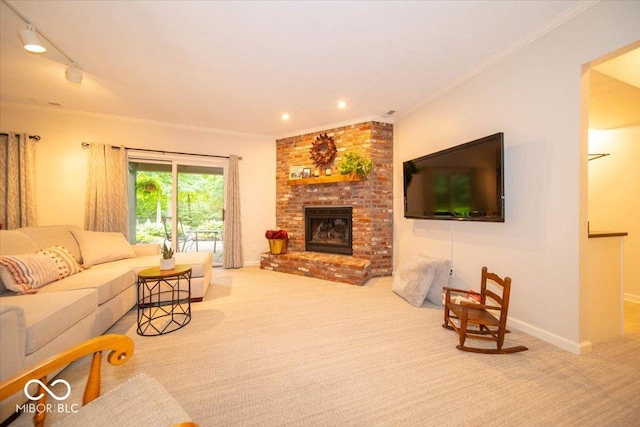 8550 Tidewater Ct, Indianapolis, IN 46236 - living room with carpet flooring, a brick fireplace, crown molding, recessed lighting, and rail lighting