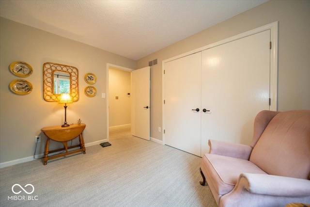 8550 Tidewater Ct, Indianapolis, IN 46236 - living area featuring light carpet and a textured ceiling