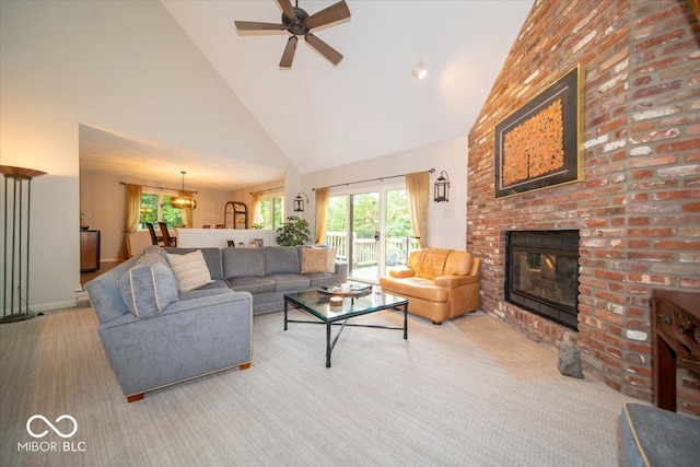 8550 Tidewater Ct, Indianapolis, IN 46236 - living room with high vaulted ceiling, a ceiling fan, and a brick fireplace