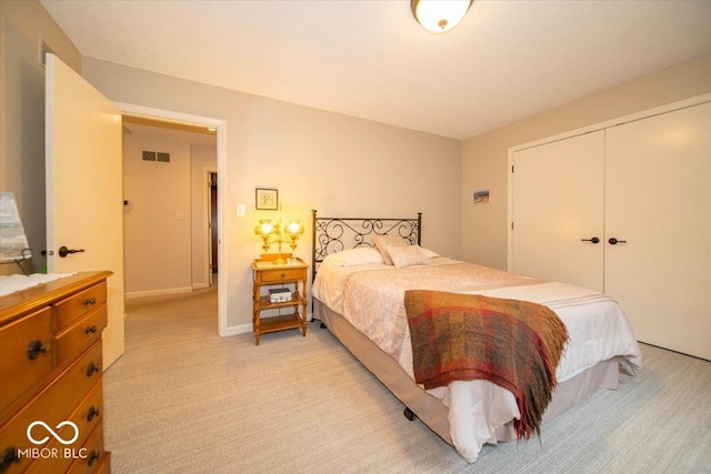 8550 Tidewater Ct, Indianapolis, IN 46236 - bedroom with light carpet and a closet