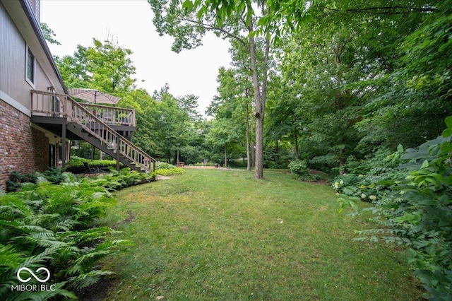 8550 Tidewater Ct, Indianapolis, IN 46236 - view of green lawn featuring stairs and a deck