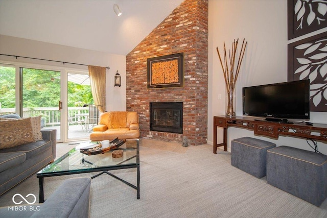 8550 Tidewater Ct, Indianapolis, IN 46236 - carpeted living room featuring high vaulted ceiling and a fireplace