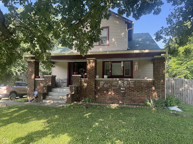 3143 Carson Ave, Indianapolis, IN 46227 - view of front facade featuring covered porch and brick siding