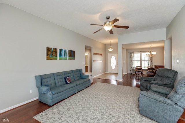 1977 Sophia Ln, Seymour, IN 47274 - living area featuring wood finished floors, a chandelier, and ceiling fan