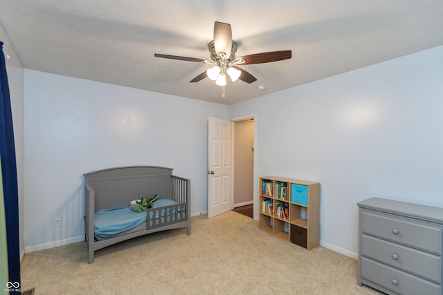 1977 Sophia Ln, Seymour, IN 47274 - bedroom with carpet floors and a ceiling fan