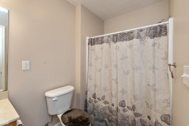 1977 Sophia Ln, Seymour, IN 47274 - bathroom featuring vanity and a shower with shower curtain