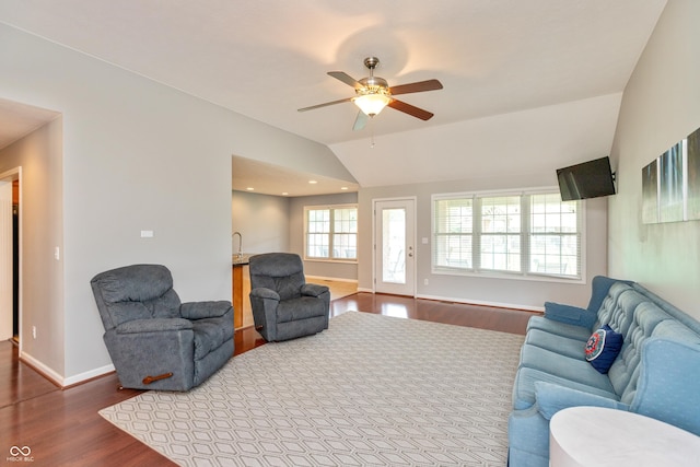 1977 Sophia Ln, Seymour, IN 47274 - living area featuring wood finished floors, lofted ceiling, and ceiling fan