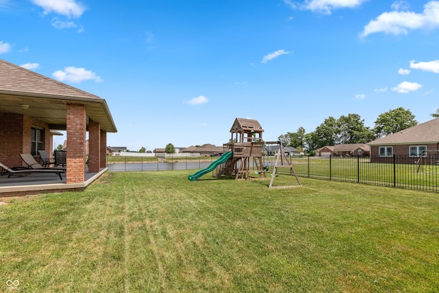 1977 Sophia Ln, Seymour, IN 47274 - fenced backyard featuring a playground