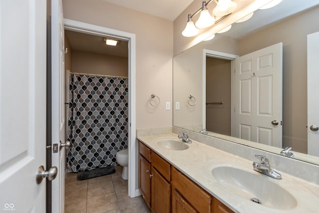 1977 Sophia Ln, Seymour, IN 47274 - full bath with double vanity, tile patterned floors, and curtained shower