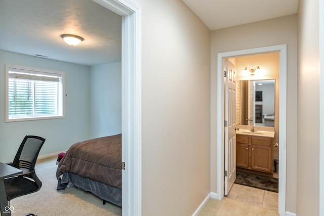 1977 Sophia Ln, Seymour, IN 47274 - bedroom featuring ensuite bath and light carpet