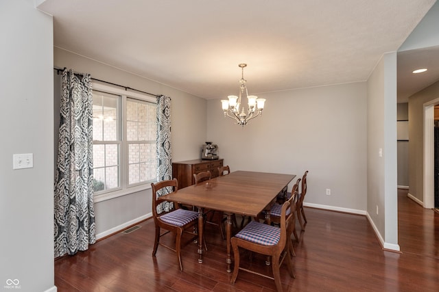 1977 Sophia Ln, Seymour, IN 47274 - dining space featuring a chandelier and dark wood finished floors