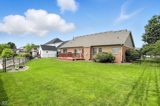 35 Decourcy Ln, Franklin, IN 46131 - back of house with a wooden deck, a fenced backyard, brick siding, and a shingled roof
