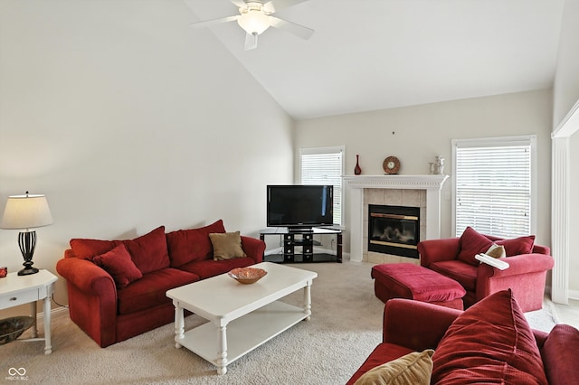 35 Decourcy Ln, Franklin, IN 46131 - living area featuring carpet flooring, a ceiling fan, a tile fireplace, and high vaulted ceiling