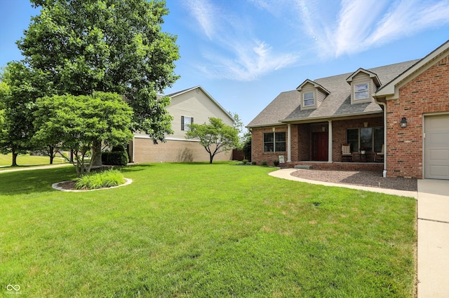 35 Decourcy Ln, Franklin, IN 46131 - view of front facade with a front yard, brick siding, and roof with shingles