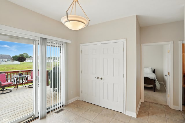 35 Decourcy Ln, Franklin, IN 46131 - foyer entrance with light tile patterned flooring and baseboards