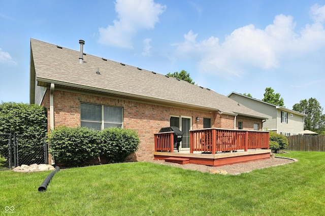 35 Decourcy Ln, Franklin, IN 46131 - rear view of house with a deck, brick siding, and a shingled roof