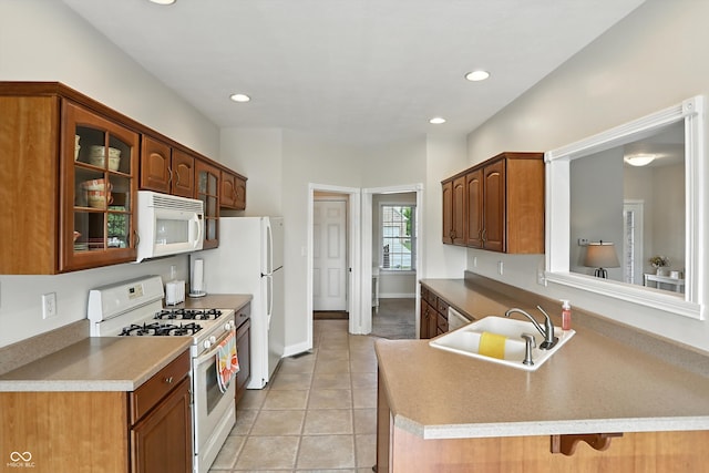 35 Decourcy Ln, Franklin, IN 46131 - kitchen with white appliances, glass insert cabinets, a peninsula, recessed lighting, and light tile patterned flooring