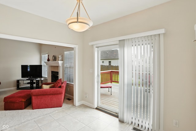 35 Decourcy Ln, Franklin, IN 46131 - living room with healthy amount of natural light and a tiled fireplace